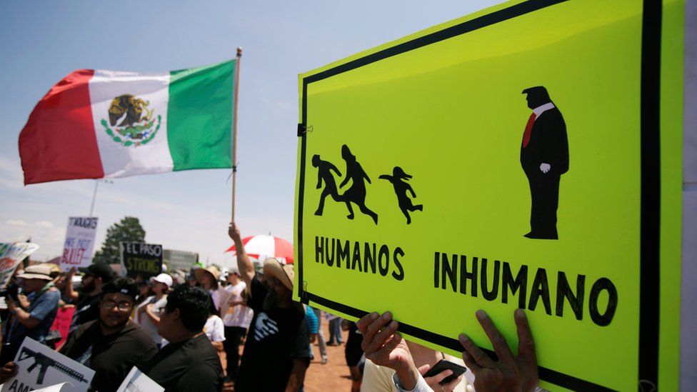 Placard reads "Humans and Inhuman", El Paso, 7 August