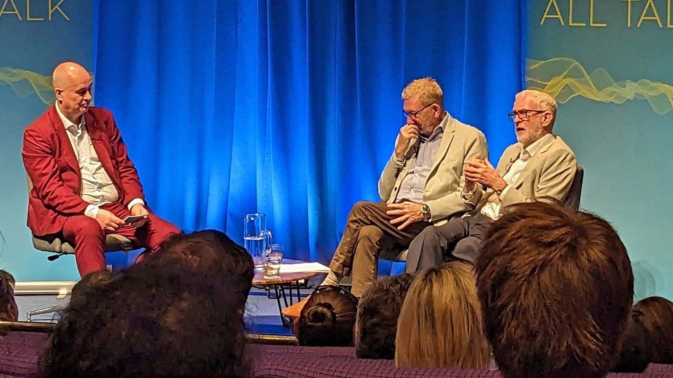 Iain Dale (left), Len McCluskey and Jeremy Corbyn sat on a stage at the Edinburgh Fringe
