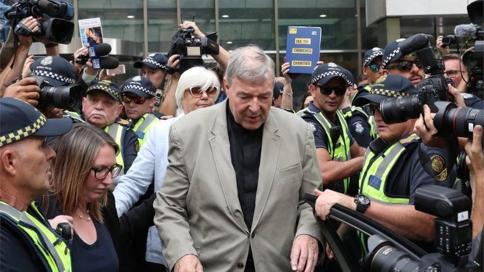 Australian Cardinal George Pell (C) leaves the County Court in Melbourne, Victoria, Australia, 26 February 2019