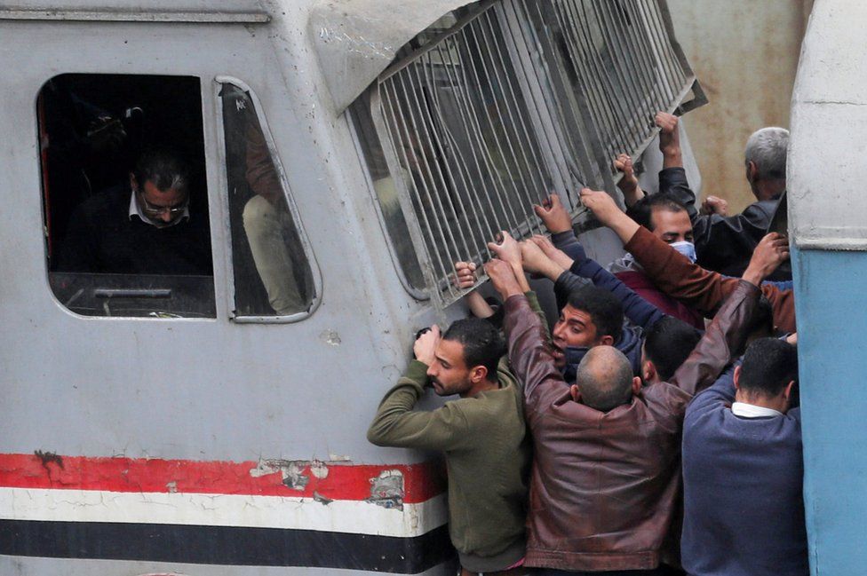 People on a train in Cairo