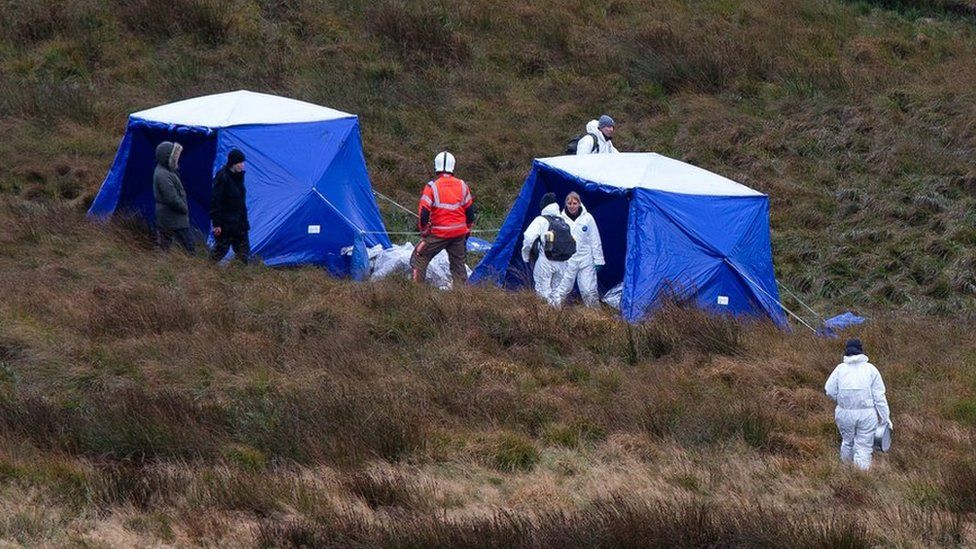 Police specialists and firefighters continue the search for Moors murder victim Keith Bennett