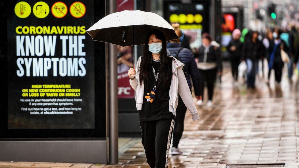 Woman wearing mask in Edinburgh