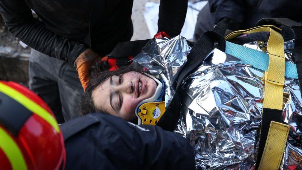 A girl on a stretcher