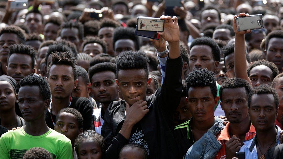 People gather for the rally of Ethiopia's new Prime Minister in Ambo, about 120km west of Addis Ababa, Ethiopia, on April 11, 2018.
