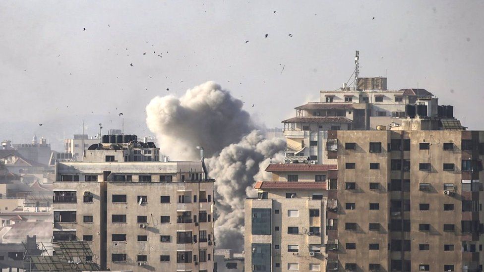 Smoke rises following an Israeli air strike in northern Gaza, 20 October