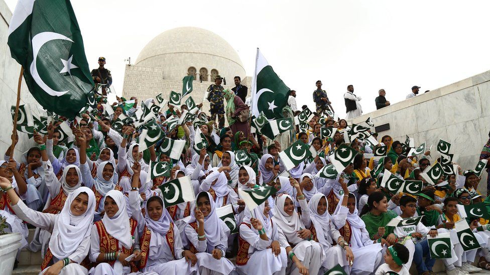Pakistani girls attend a ceremony at the mausoleum of founder of Pakistan, Muhammad Ali Jinnah, as national celebrates the Independence Day, in Karachi, Pakistan, 14 August 2017