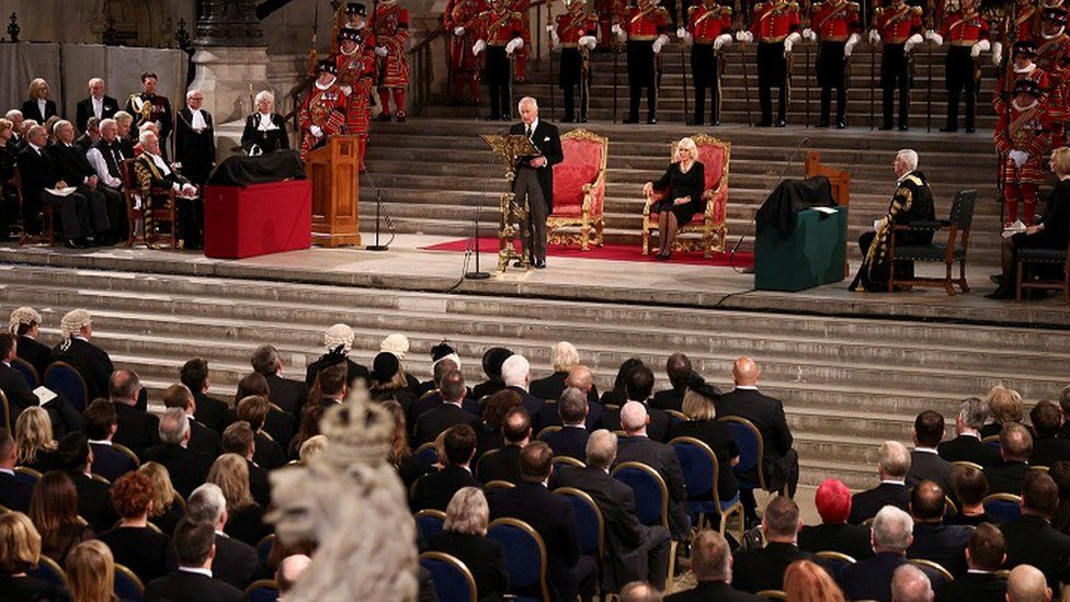King Charles III was accompanied by his wife the Queen Consort while he addressed MPs and peers