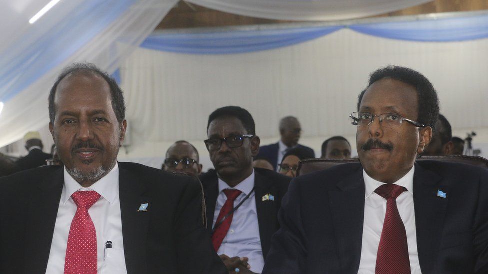 Hassan Sheikh Mohamud sitting next to former President Mohamed Abdullahi Farmajo
