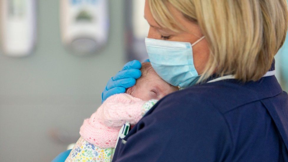 A baby being transferred to a temporary neonatal unit at Nottingham Children's Hospital