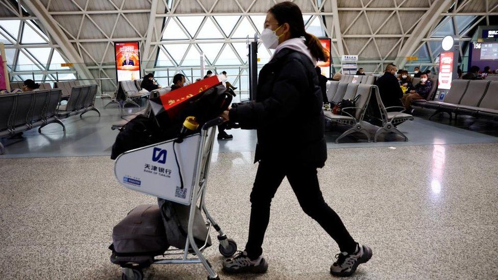 A rider  astatine  Chengdu International Airport successful  China connected  30 December
