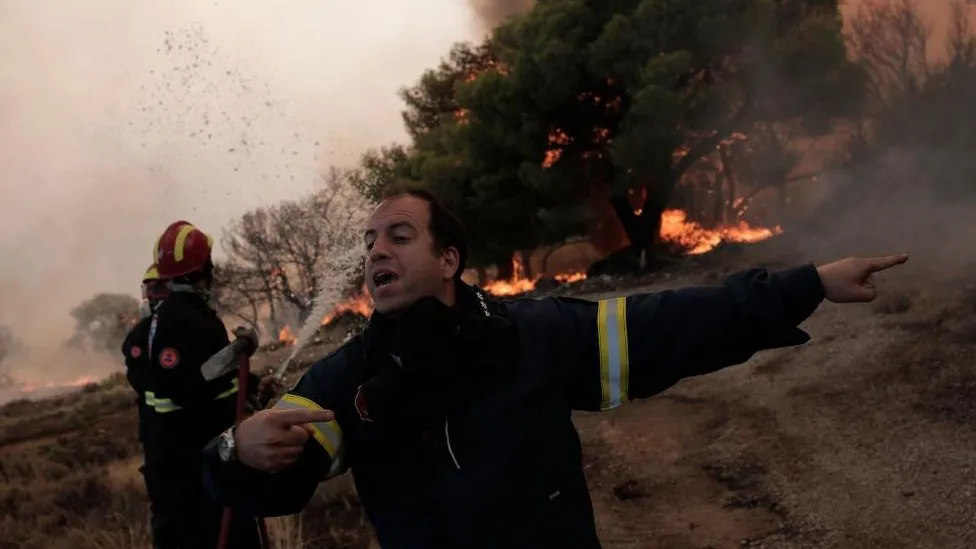 Greek fires rage after migrant tragedy near border