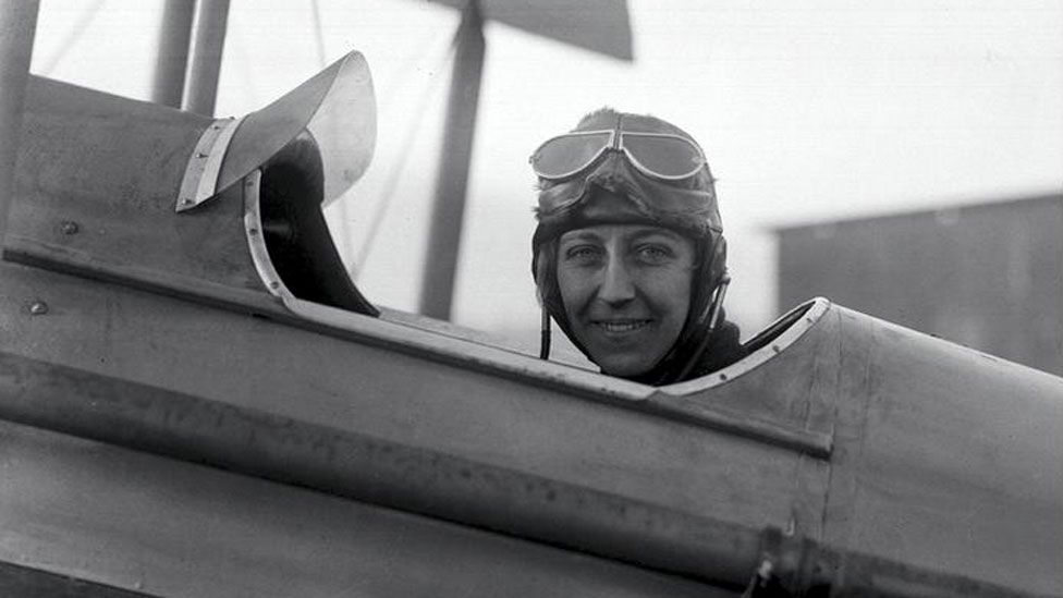 Amy Johnson sat in cockpit