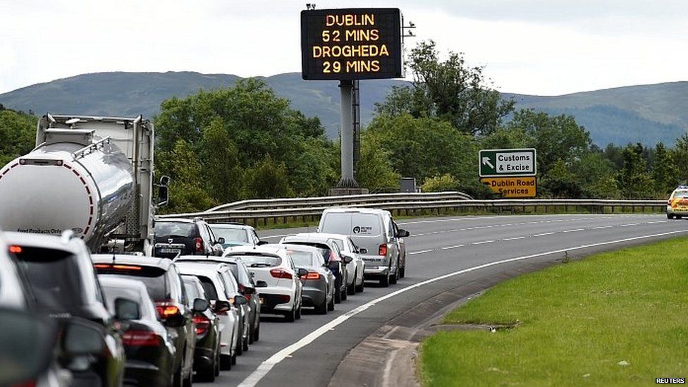 Vehicles queue on the approach to the border between the Irish Republic and Northern Ireland