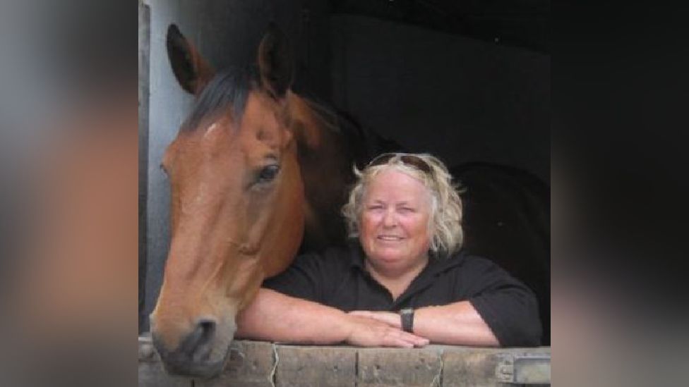 A woman found dead in Swansea has been named as Wendy Buckney