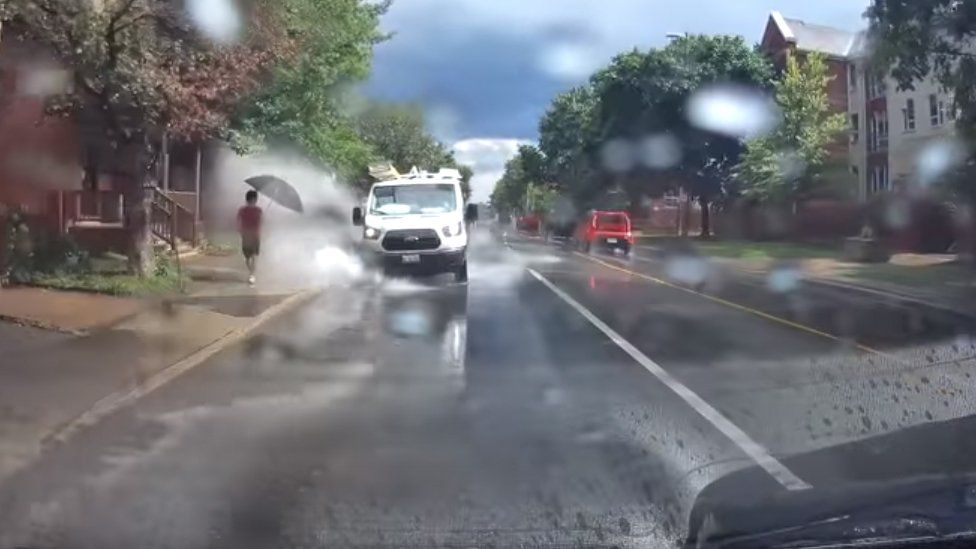 Canadian puddle splash van driver loses job - BBC News