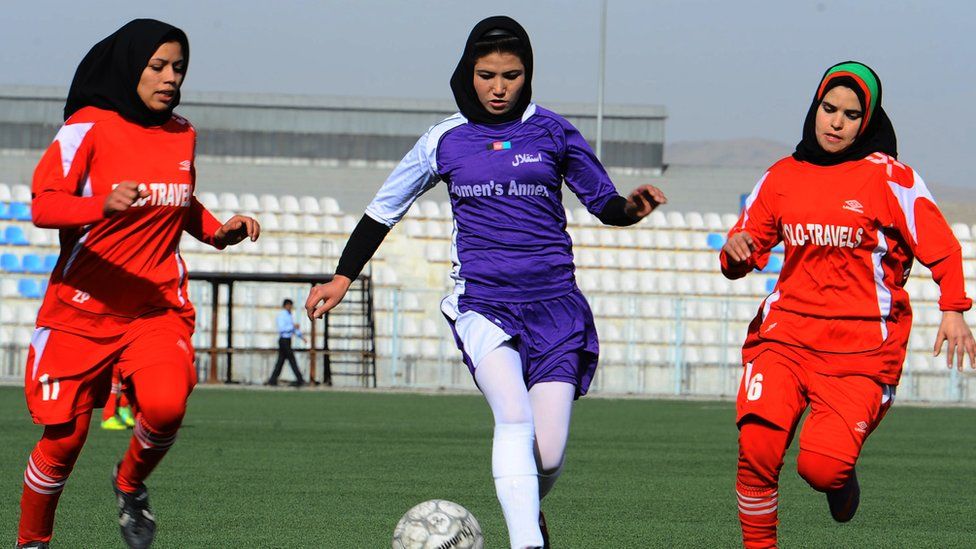 Women playing football in hijab in Kabul in 2013.