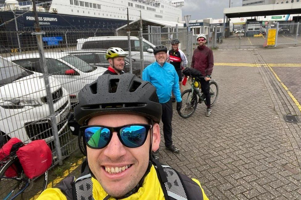 The cyclists next to the ferry