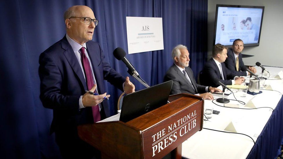 lawyers at news conference