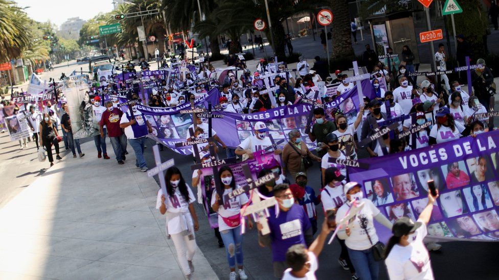 Relatives and friends of victims of femicide hold a march in Mexico City