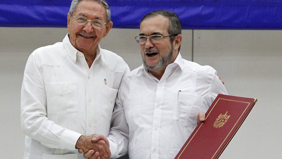 Raul Castro President of Cuba (L) and Timoleon Jimenez "Timonchenko" (R) shake hands during a meeting to announce the Ceasefire Agreement between Colombian Government and the FARC rebels on June 23, 2016 in Havana, Cuba