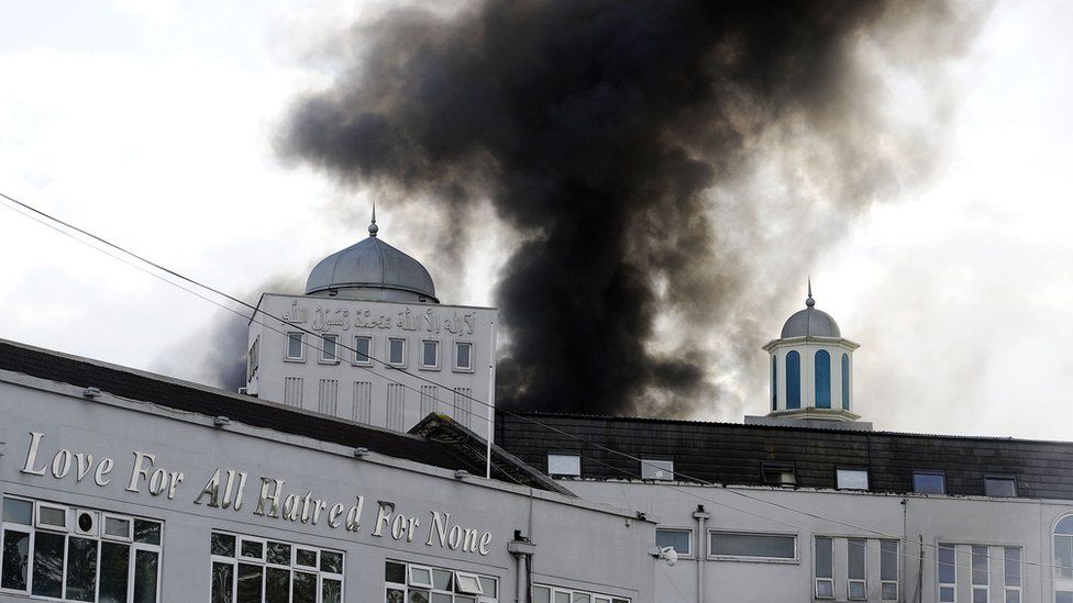 The mosque's administration building on fire on 26 September 2015
