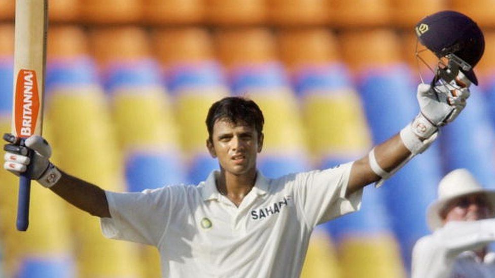 Indian Cricketer Rahul Dravid celebrates his century (100 runs) during the first day of the first Test match between India and New Zealand in Ahmedabad, 08 October 2003.