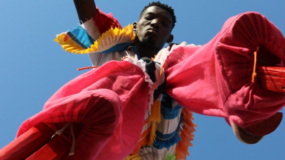 Shot of man on stilts in Sekondi Ghana