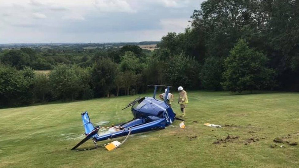 Pilot injured as helicopter overturns in Barwell on takeoff BBC News