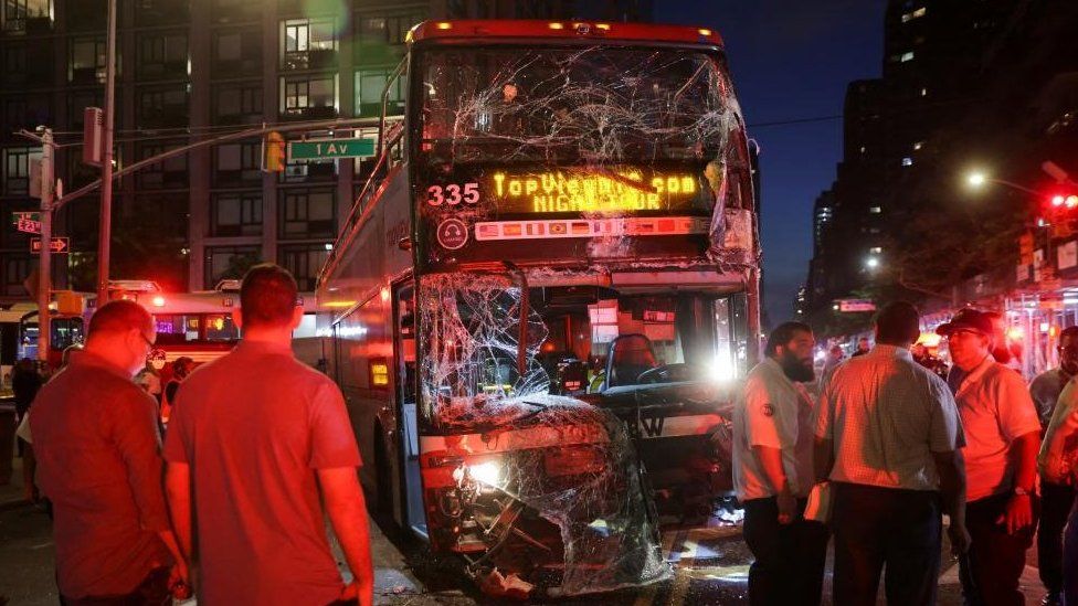 The tourist bus seen in a Reuters news photograph which shows its heavily damaged front glass panel