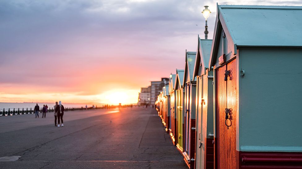 Beach Huts during sunset at Brighton and Hove, England