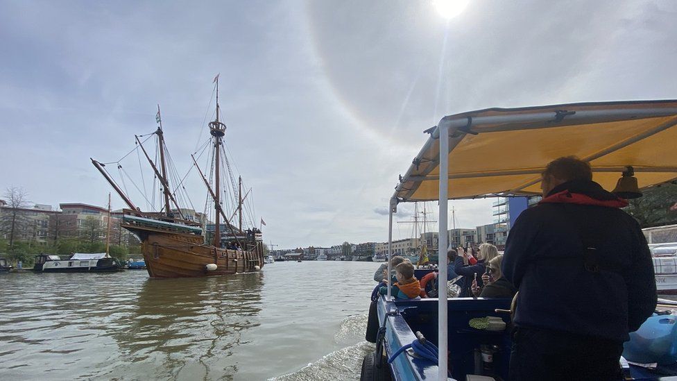 A Bristol Ferry boat passes The Matthew on Bristol's Floating Harbour