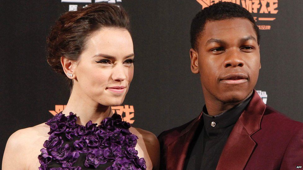 Daisy Ridley and John Boyega at a Star Wars event in December 2015