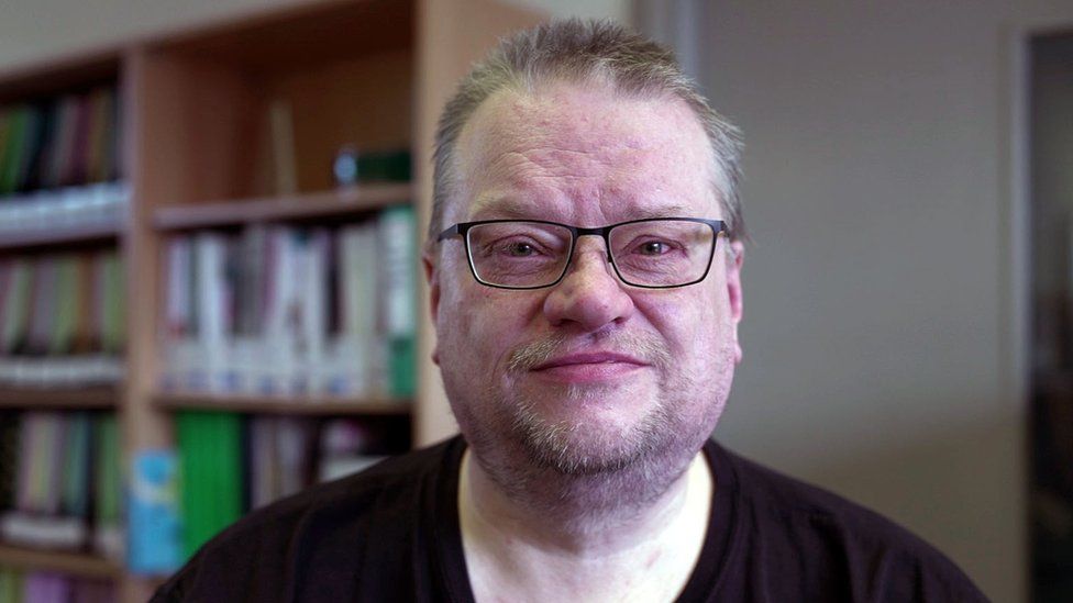 Campaigner Rick Burgess pictured at the offices of Disabled People Against Cuts