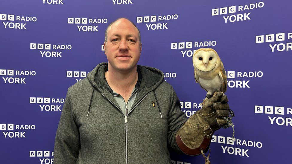 Ryan Stocks with one of his owls