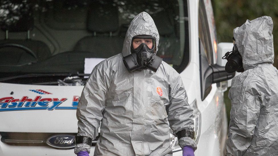 Investigators in protective clothing remove a van from an address in Winterslow near Salisbury, as police and members of the armed forces continue to investigate the suspected nerve agent attack on Russian double agent Sergei Skripal on March 12, 2018