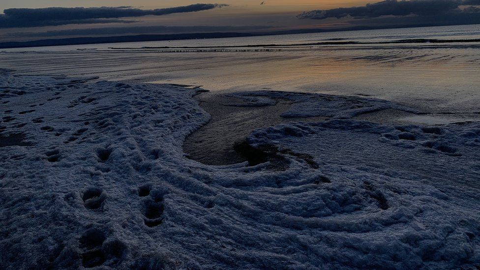 Frozen sea foam at Berrow Beach in North Somerset