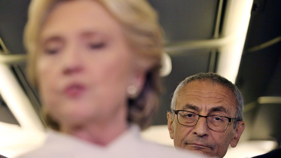 John Podesta aboard 'Hill Force One', the nickname for Clinton's campaign plane