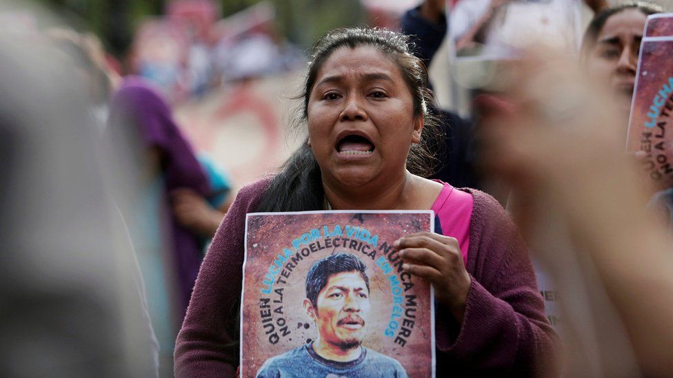 A demonstrator takes part in a protest to demand justice for Mexican activist Samir Flores Soberanes