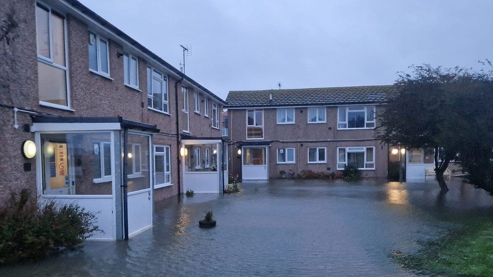 Flood water outside homes in Llandudno
