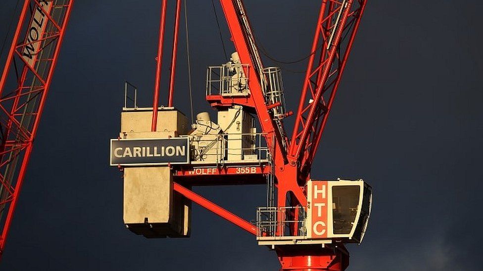 Crane with Carillion banner on it