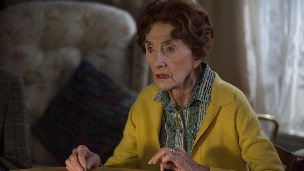 June Brown as Dot Branning. Dr. Legg's solicitor comes to see Dot about the will.