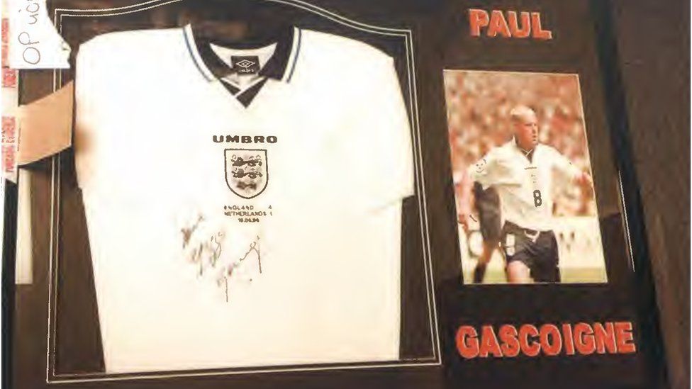 A signed Paul Gascoigne shirt as amongst the football memorabilia bought by Munday