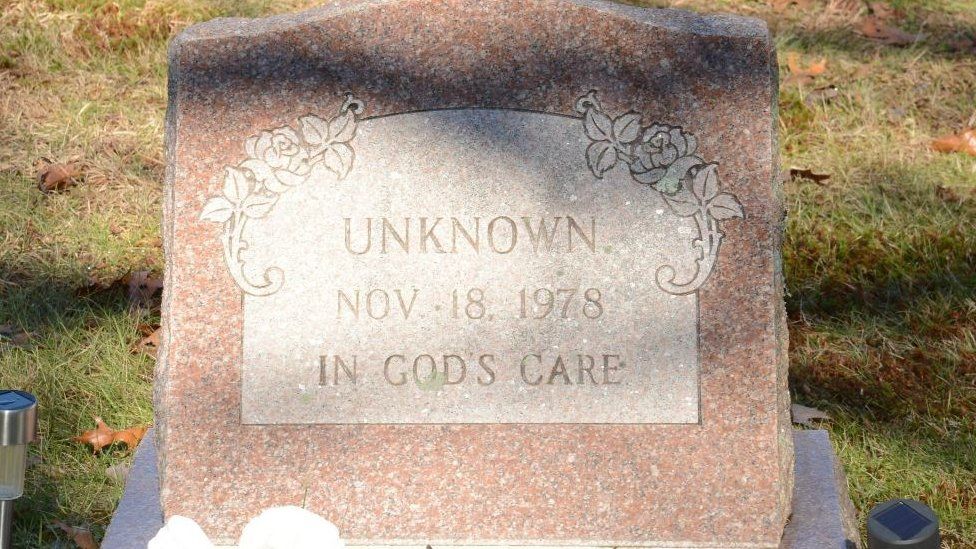 Headstone marked "unknown"