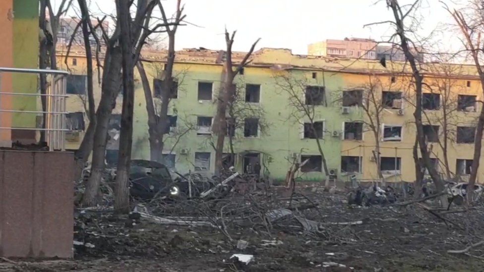 Bomb damage outside Mariupol maternity hospital