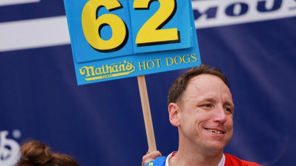 World Champion Joey Chestnut looks on, on the day of 2023 Nathan's Famous Fourth of July International Hot Dog Eating Contest at Coney Island in New York City