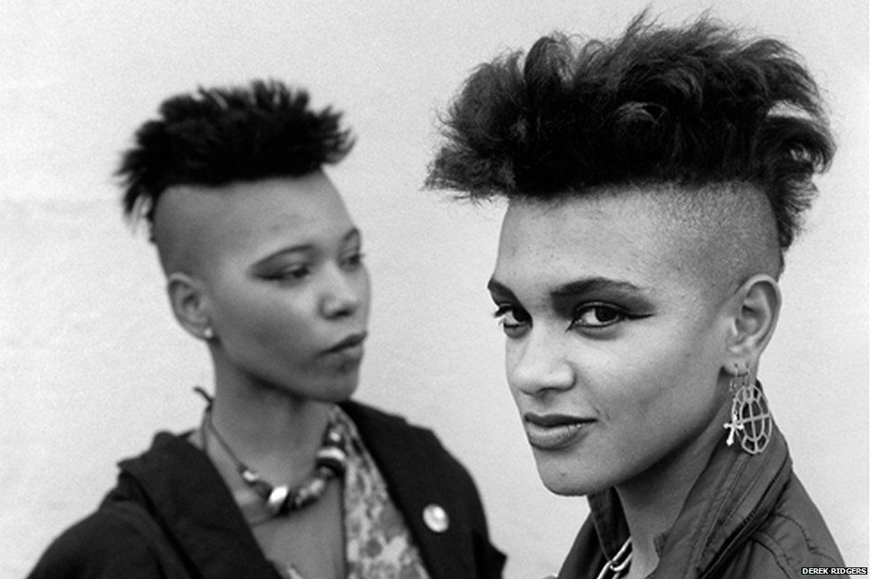 Two women in the 80s with buzzcuts