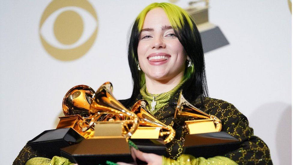 Billie Eilish with her Grammy awards