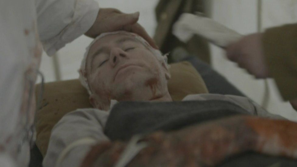 A wounded soldier in a scene from the film