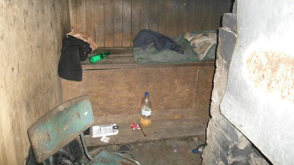 A shack in Latvia where a victim was housed in freezing temperatures