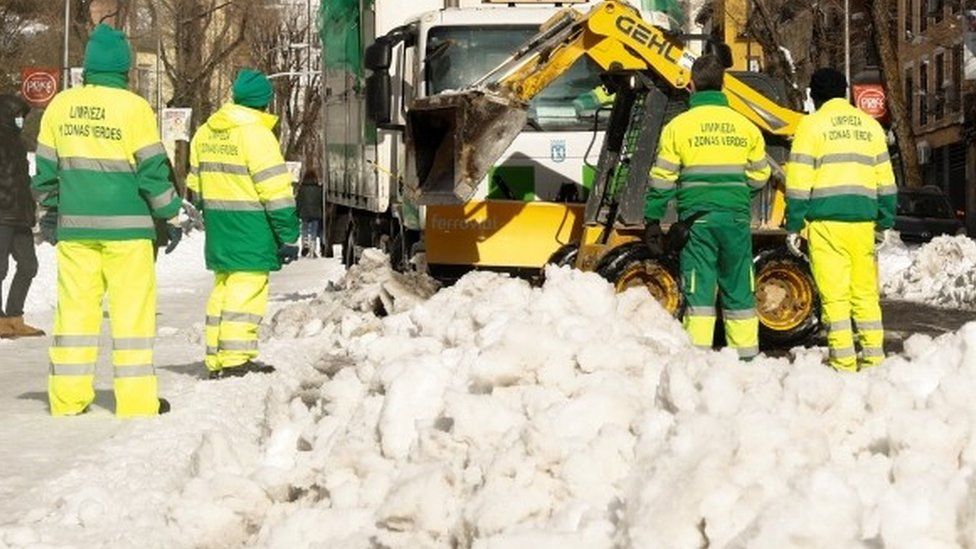 Municipal workers clear snow in Madrid, Spain. Photo: 10 January 2021